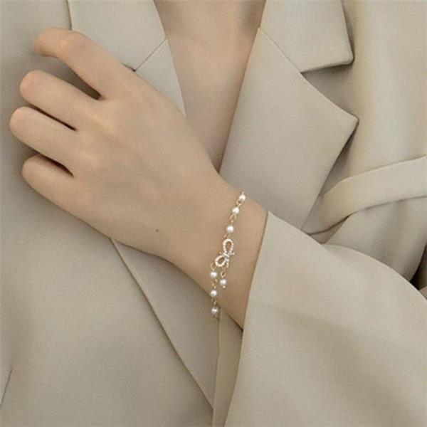 White Pearl Bow Gold Chain Bracelet